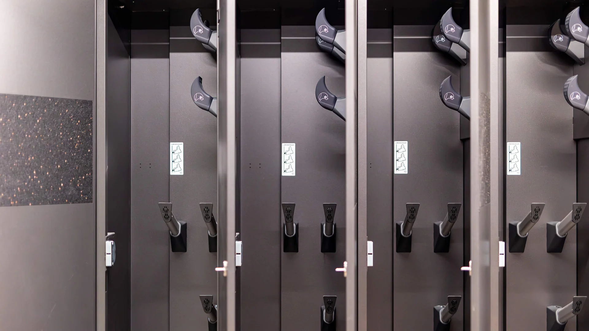 Empty lockers with helmets in a sports facility