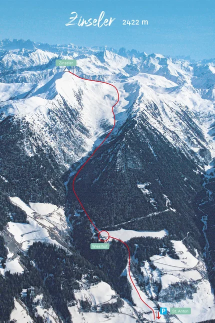 Snow-covered mountain landscape with marked route from St. Anton to Zinseler peak